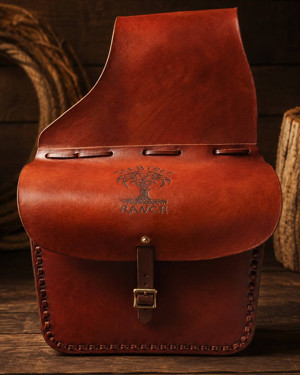 Front view of a brown Crabtree Ranch leather saddle bag.